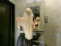 big tits long haired sexy blonde prepares for the night in a see through mini skirt with underknee socks and no panties