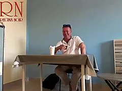 Naked waitress feels the guest eating from her navel in the restaurant