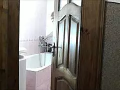 Naked blonde in bathroom, roommate watches and cums on her wet pussy?