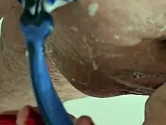 shaving his dick and balls right now