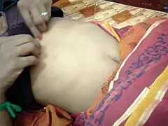 in the morning, a beautiful asian mommy engages in an activity in the kitchen with her husband