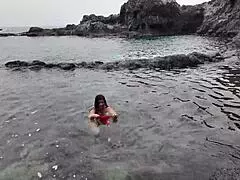 a stepmom practices sucking candy on beach then sucks stepsons dick