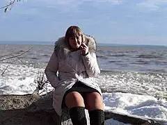 Fat MILF Pisses Outdoors and Smokes. She Shows Her Hairy Pussy Without Panties Under Short Skirt in Public Fetish by the River Bank.