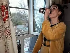 The stepsister lights up a cigarette in a quiet moment