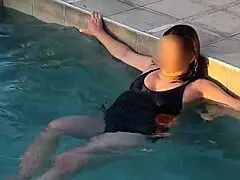At the pool, a beautiful stepmom exposes her tits in public, craving cock.