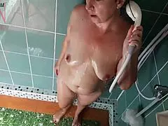 Nudist housekeeper regina noir washes in the shower with soap naked maid shaves her pussy brushes teeth naked housewife