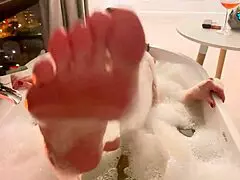 Milf enjoys hot bath and reaches orgasm.