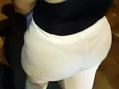 Mature woman in red thong and transparent leggings on street