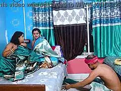 Two Desi Mallu Bhabhis Threesome with Servant at Home
