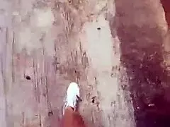 Stepmother with big boobs walks outside