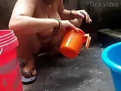 Wife's Outdoor Garden Bath Reveals Indian Pussy And Big Tits