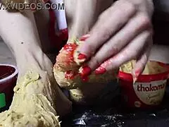 Blonde Bodybuilder Spreads Peanut Butter on Feet for Steamy Footjob Fantasy