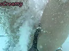 Flashing my pussy to a student at the public pool then he helps me rub it risky with crowds nearby!