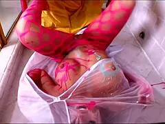 blonde whore in fishnets fingers her shaved hole before anal pounding