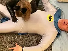 granny catwoman deep throats batman's cock doesn't she