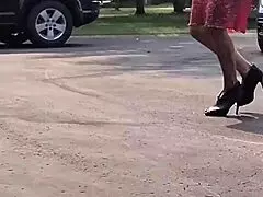 tall classy blonde wife in sexy dress parades her skinny legs and high heels outdoor for homemade fetish tease