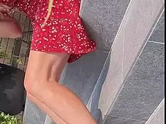 tall classy blonde wife in sexy dress parades her skinny legs and high heels outdoor for homemade fetish tease