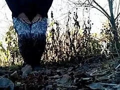 ever seen a mature babe piss wild in the woods?