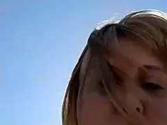 blonde milf with big natural tits and pussy lips pisses fetish solo on beach.