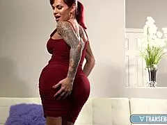 hey check out this arousing latina ts foxxy stripping her sexy red dress to play solo