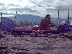 hey honey, watch my cock tease on this nude beach again?