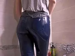 Girl teases prominent camel toe in tight blue jeans