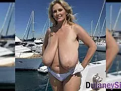 blonde milf with massive tits teases her curves craving a deep hard fuck