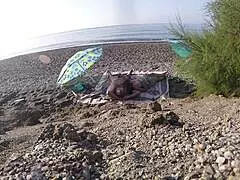 Voyeur catches wife sucking huge cock on nude beach?