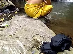 Buddy fucks busty aunt in jungle pond amid public bathers