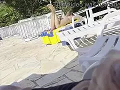 out by the public pool i was stroking my big cock when this busty milf with natural tits spotted me and helped jerk me off till i shot cum everywhere close up