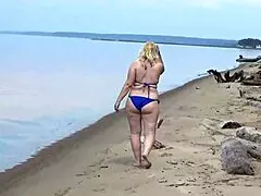 wild beach walk shows milfs strutting bikinis big asses and natural tits