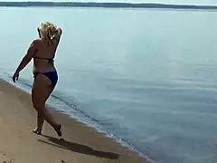 wild beach walk shows milfs strutting bikinis big asses and natural tits