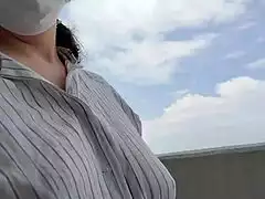 naughty wife masturbates lewdly in apartment hallway.