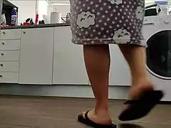 Wife sneaks flirty moment with handyman under kitchen sink