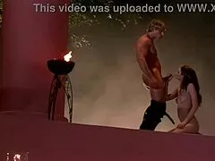 Three blonde milfs in lingerie and stockings gather on the bed for a private session. They pose in heels and fishnets.