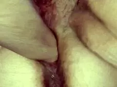 Watch this fat milf's nasty hairy pussy get fist fucked till it squirts wet!