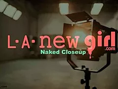 fair-haired model shows off her sexy petite body on sofa