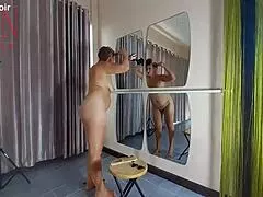 Naked nudist hairdresser Regina Noir trims her juicy shaved pussy lips beachside