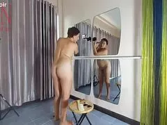 Naked nudist hairdresser Regina Noir trims her juicy shaved pussy lips beachside