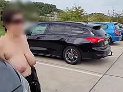 a busty mature wife flashes her saggy natural tits topless outdoors on public road