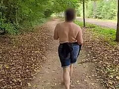 a curvy busty milf steps out flashing her huge saggy naturals in public outdoor tease