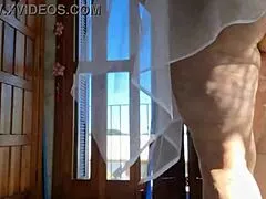 voyeur cam catches milf mother in law cleaning in see through skirt