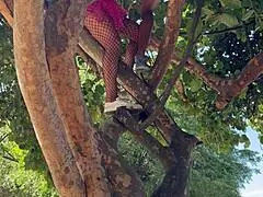 carnival chick climbs tree in the crowd gets pussy fucked and swallows stranger's cum right there