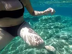 milf struts black bikini deep underwater