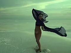 a mature woman performs erotic naked dance on salt lake elton's crust