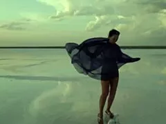 a mature woman performs erotic naked dance on salt lake elton's crust