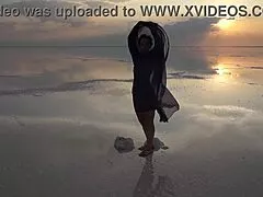 a mature woman performs erotic naked dance on salt lake elton's crust