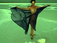 a mature woman performs erotic naked dance on salt lake elton's crust