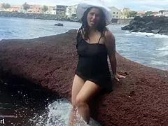 Curvy brunette lady slips into sexy outfit masturbates hairy pussy on beach during outdoor photoshoot voyeur session