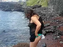 Does Curvy Brunette Masturbate Naked on Beach During Sexy Photoshoot?